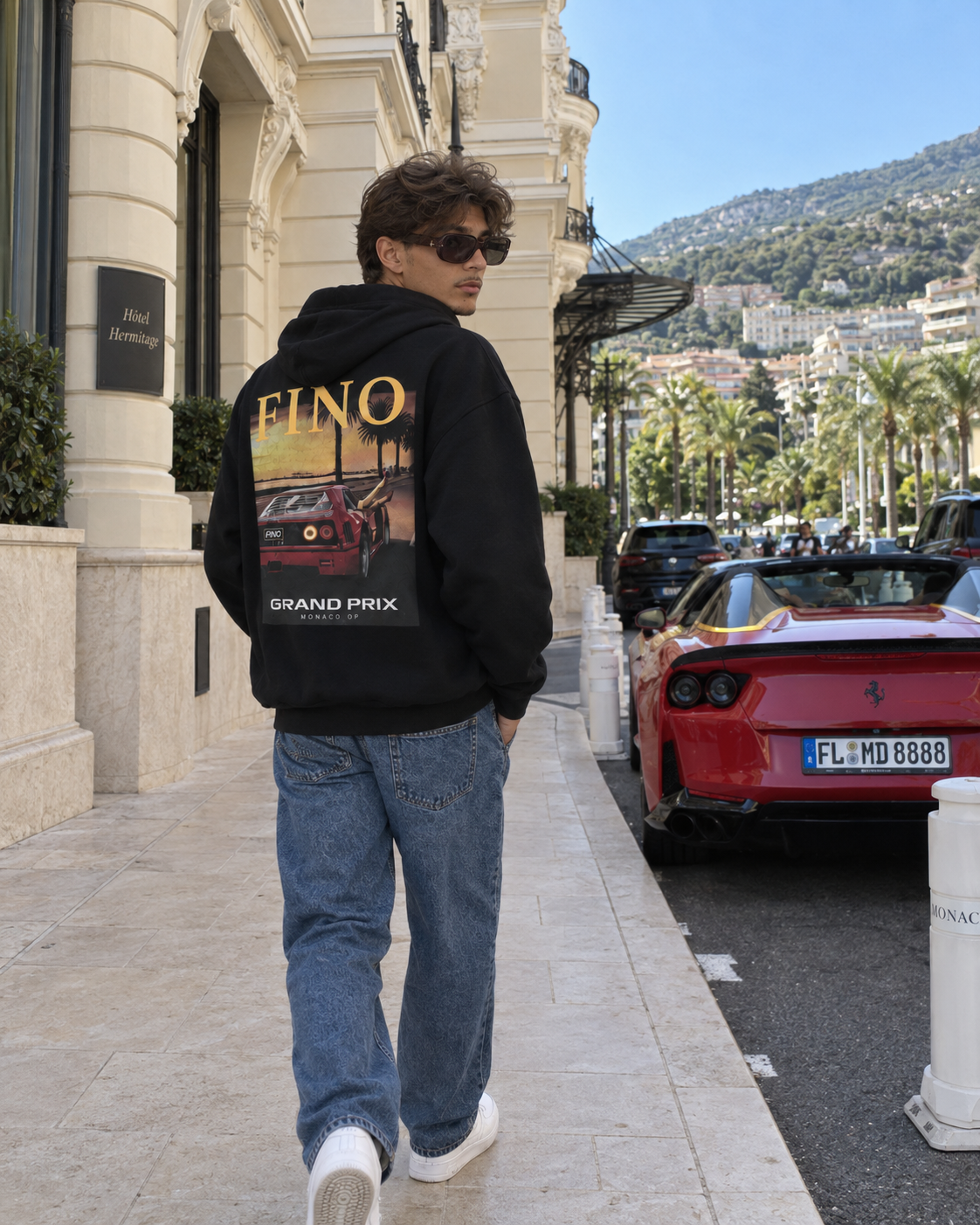 After Hours Hoodie — male model, back view in a Monaco lifestyle setting.